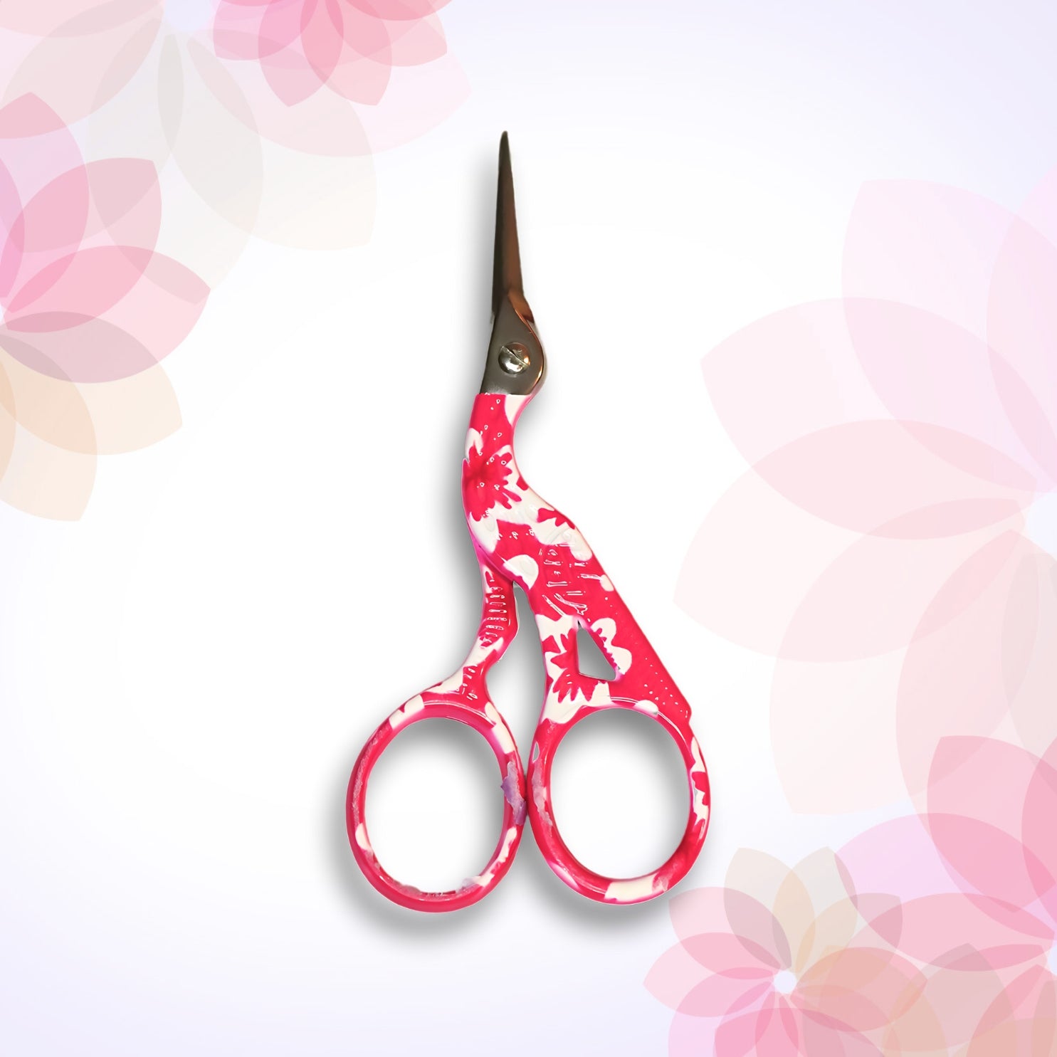 Pink scissors with floral pattern 