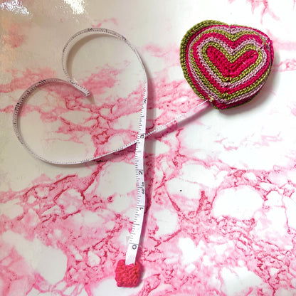 pink tape measure heart