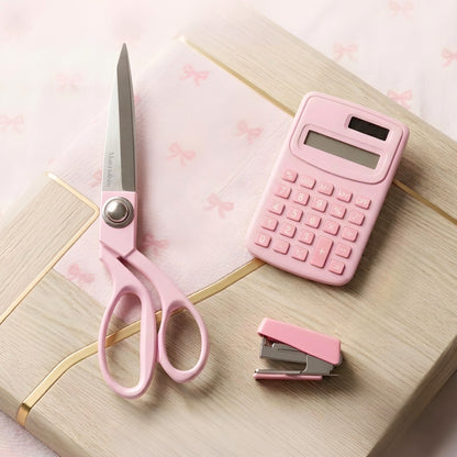 pink scissors and pink office supplies