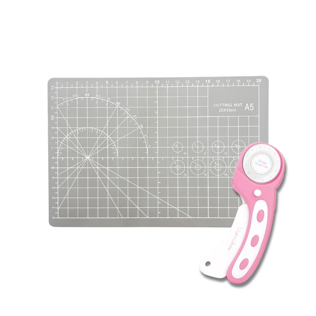 rotary cutter + mat for sewing 