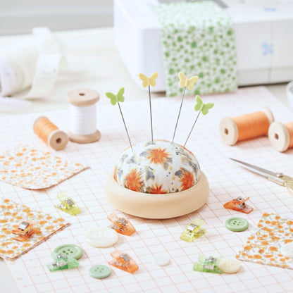 floral wooden pincushion